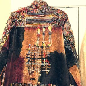 Multi-colored bohemian vintage jacket.